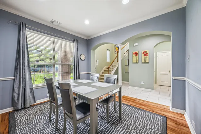 a view of a dining room with furniture
