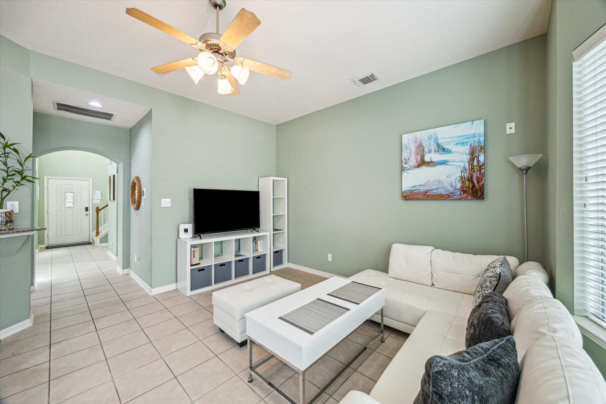 2403 Clippers Square Houston, TX 77058 - Photo 6 of 20 a living room with furniture and a flat screen tv
