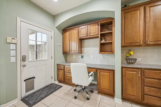 a workspace with cabinets