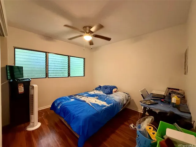 a backyard of a house with yard and garage