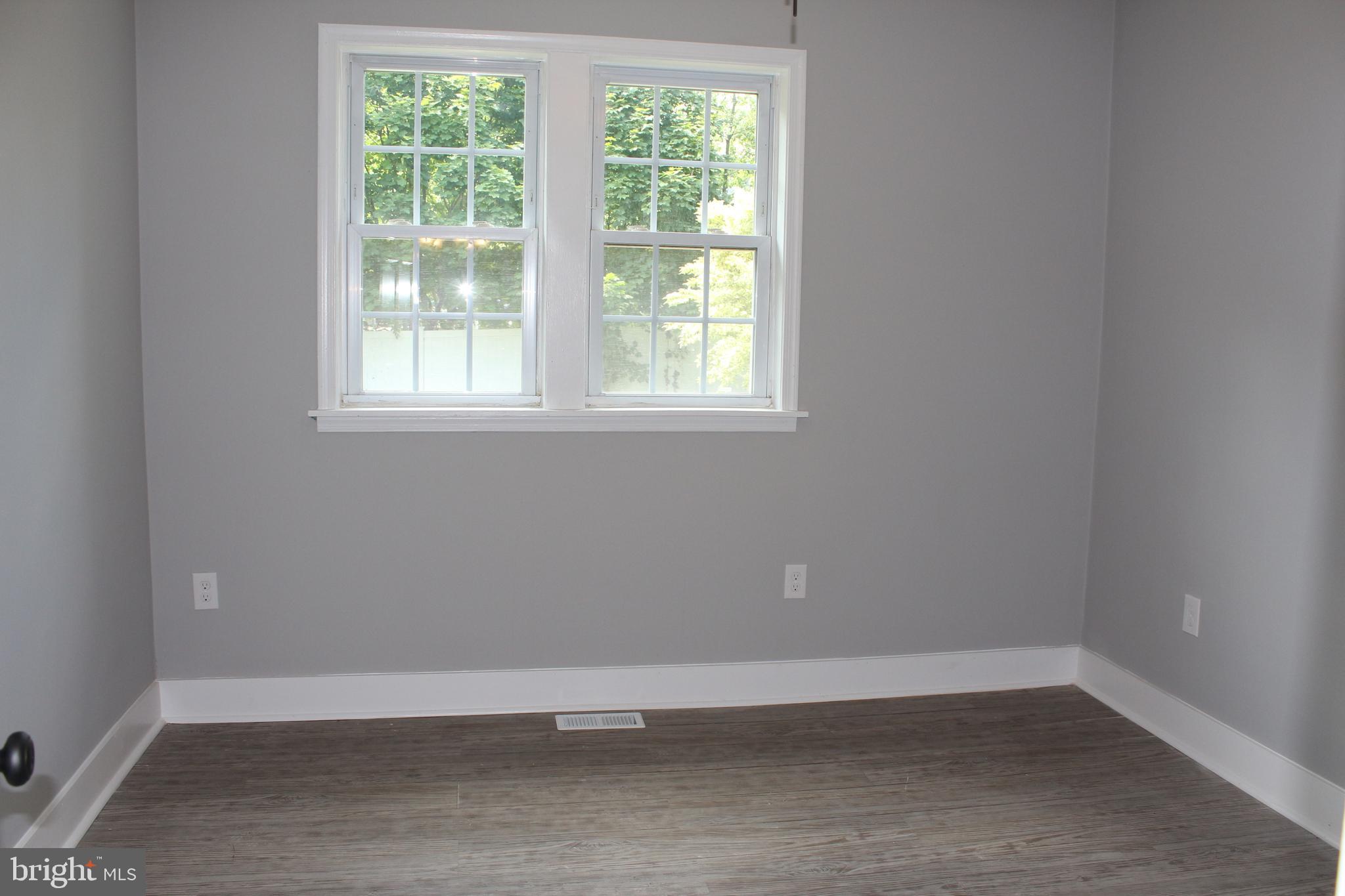 25 Church Street Glassboro, NJ 08028 - Photo 16 of 21 an empty room with a window