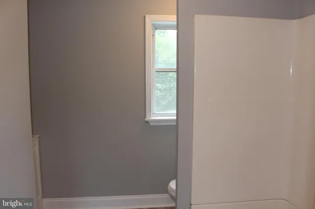 a bathroom with a window