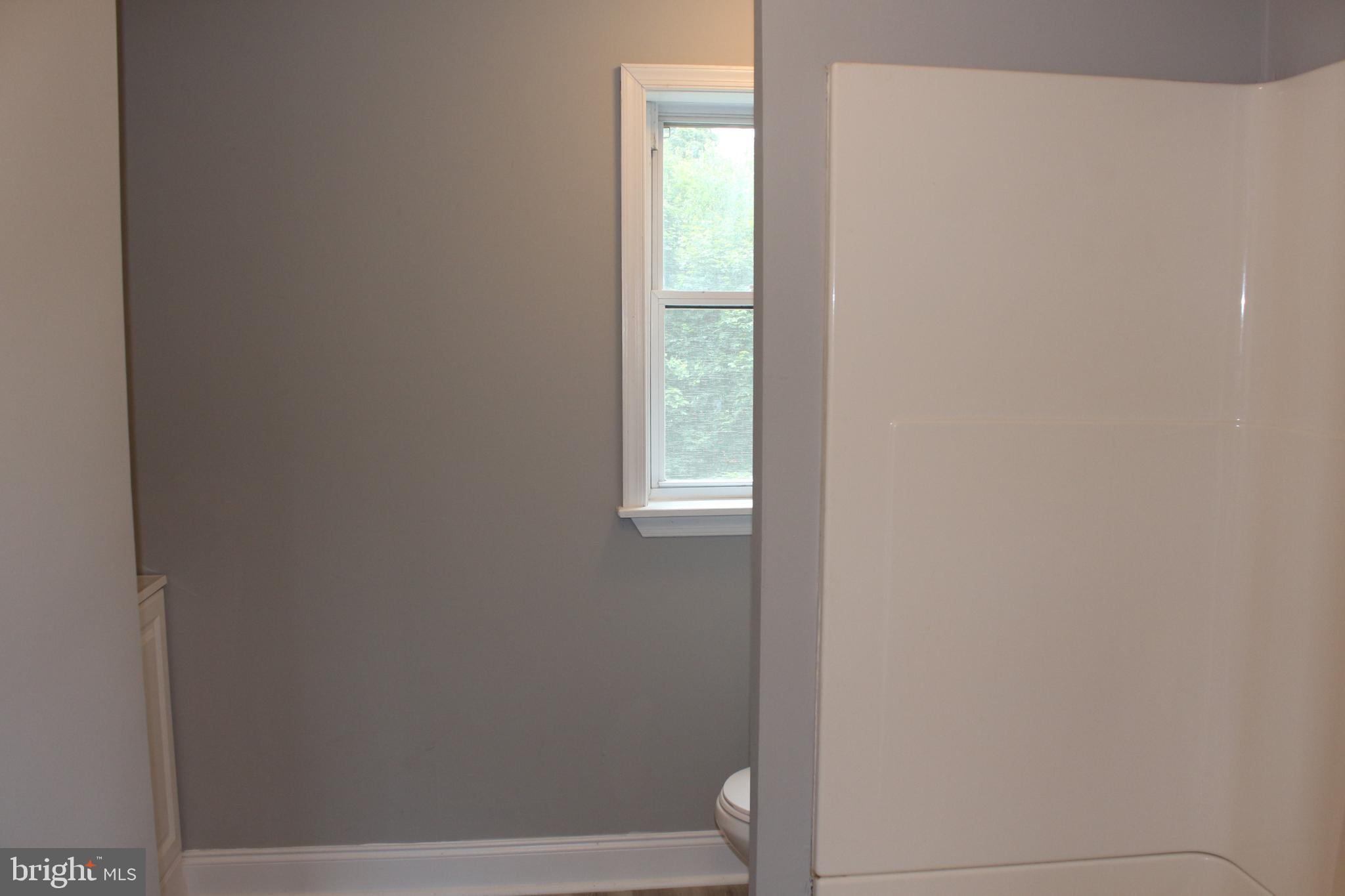 25 Church Street Glassboro, NJ 08028 - Photo 21 of 21 a bathroom with a window