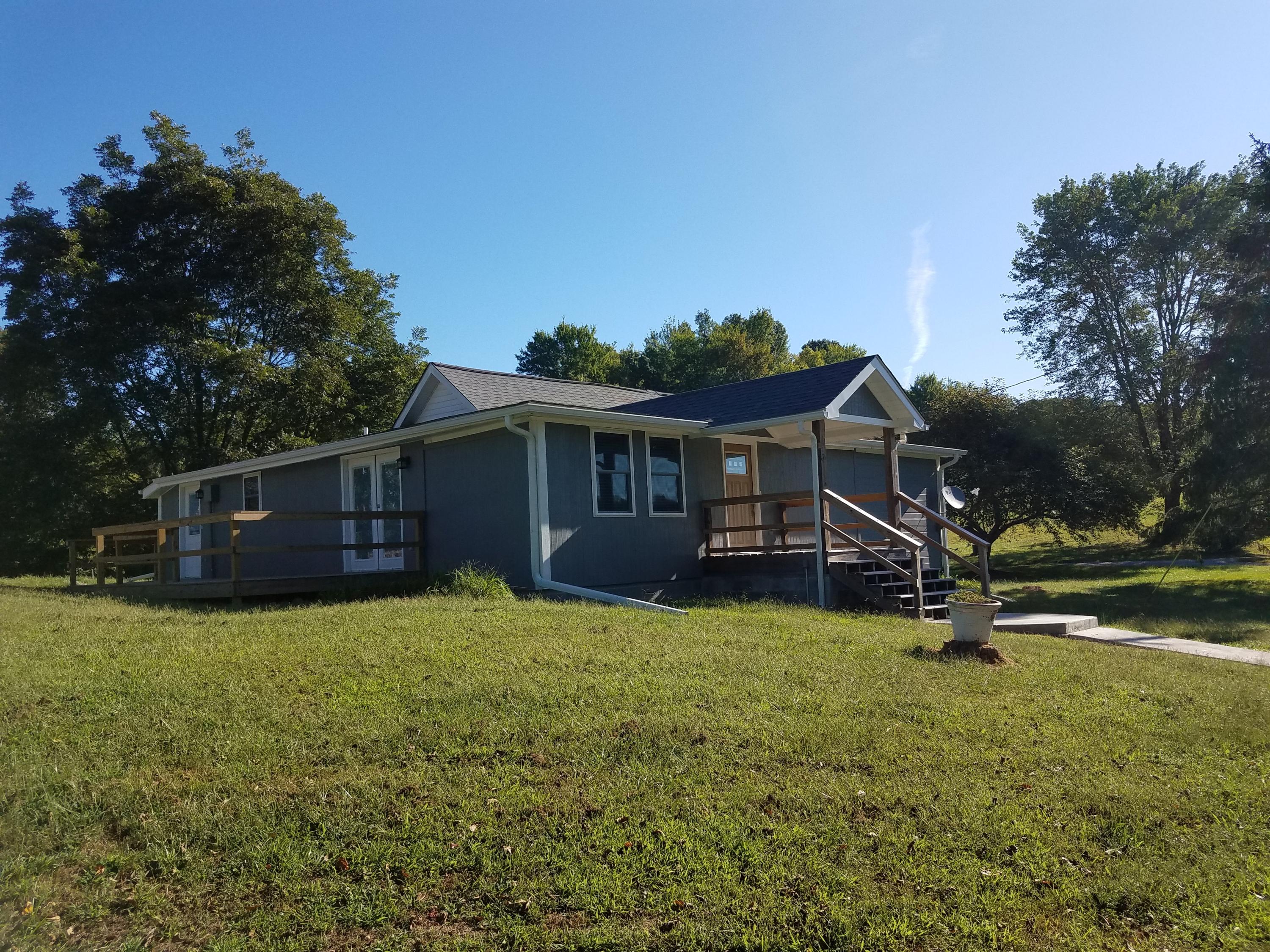 724 Widner Road New Tazewell, TN 37825 - Photo 1 of 36 Outside house 1 10.15.19