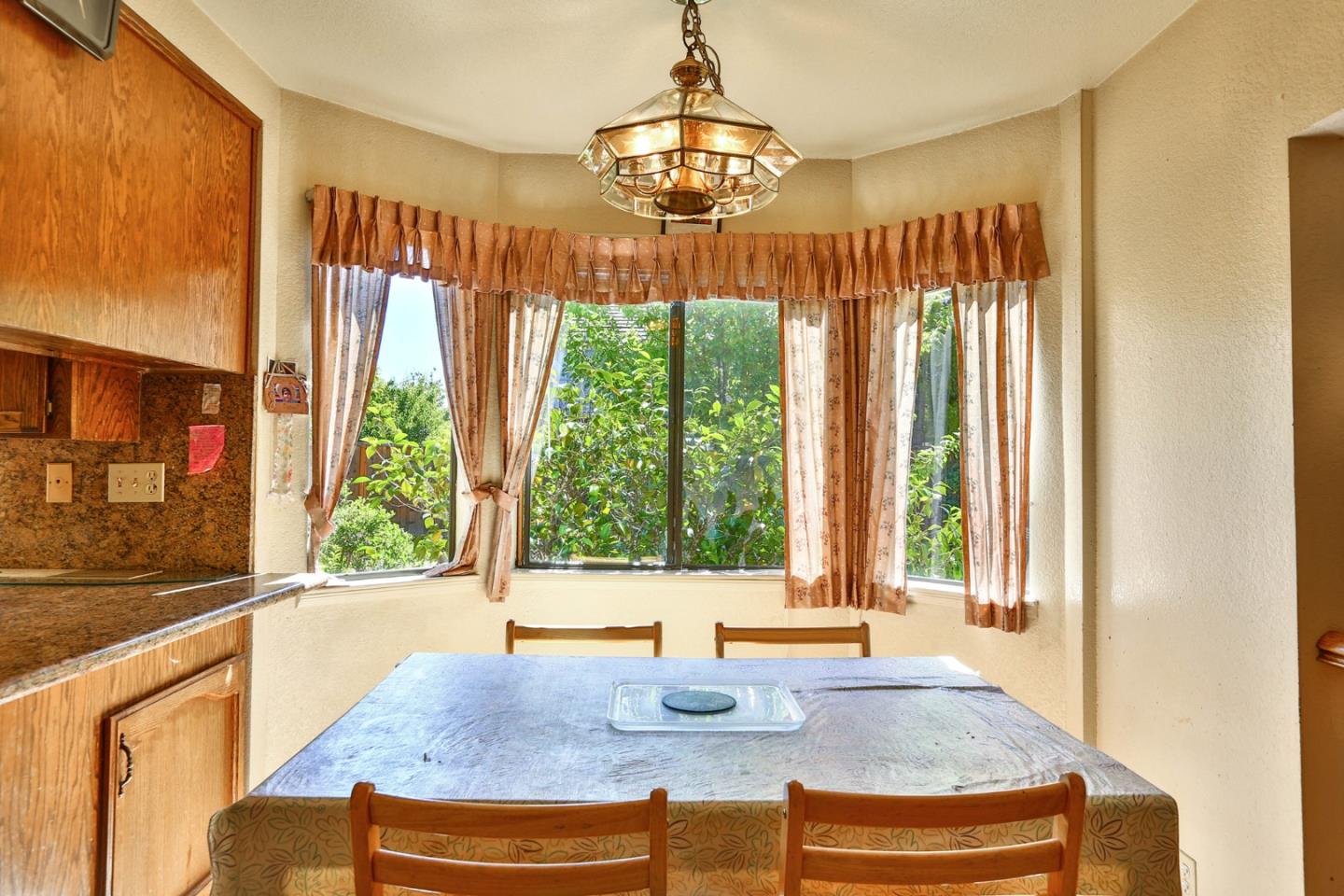 6964 McCall Drive San Jose, CA 95120 - Photo 12 of 57 a kitchen with sink and large window