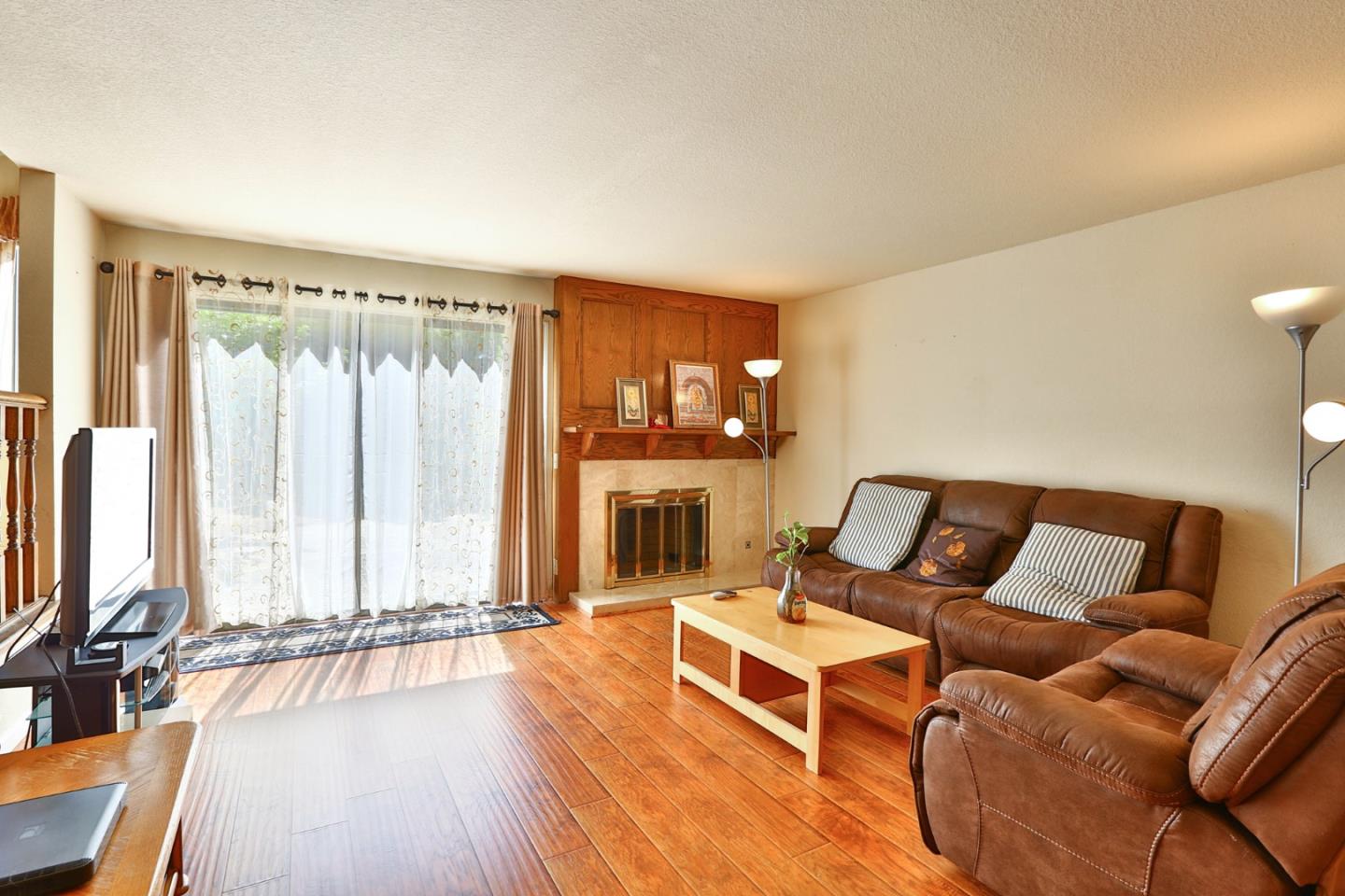 6964 McCall Drive San Jose, CA 95120 - Photo 13 of 57 a living room with furniture window and wooden floor