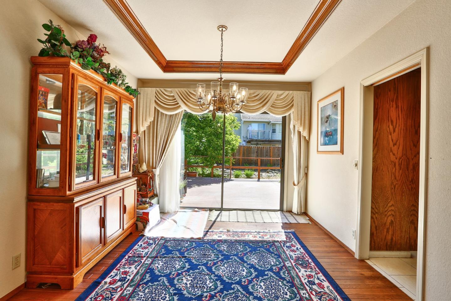 6964 McCall Drive San Jose, CA 95120 - Photo 16 of 57 a view of an entryway with a chandelier