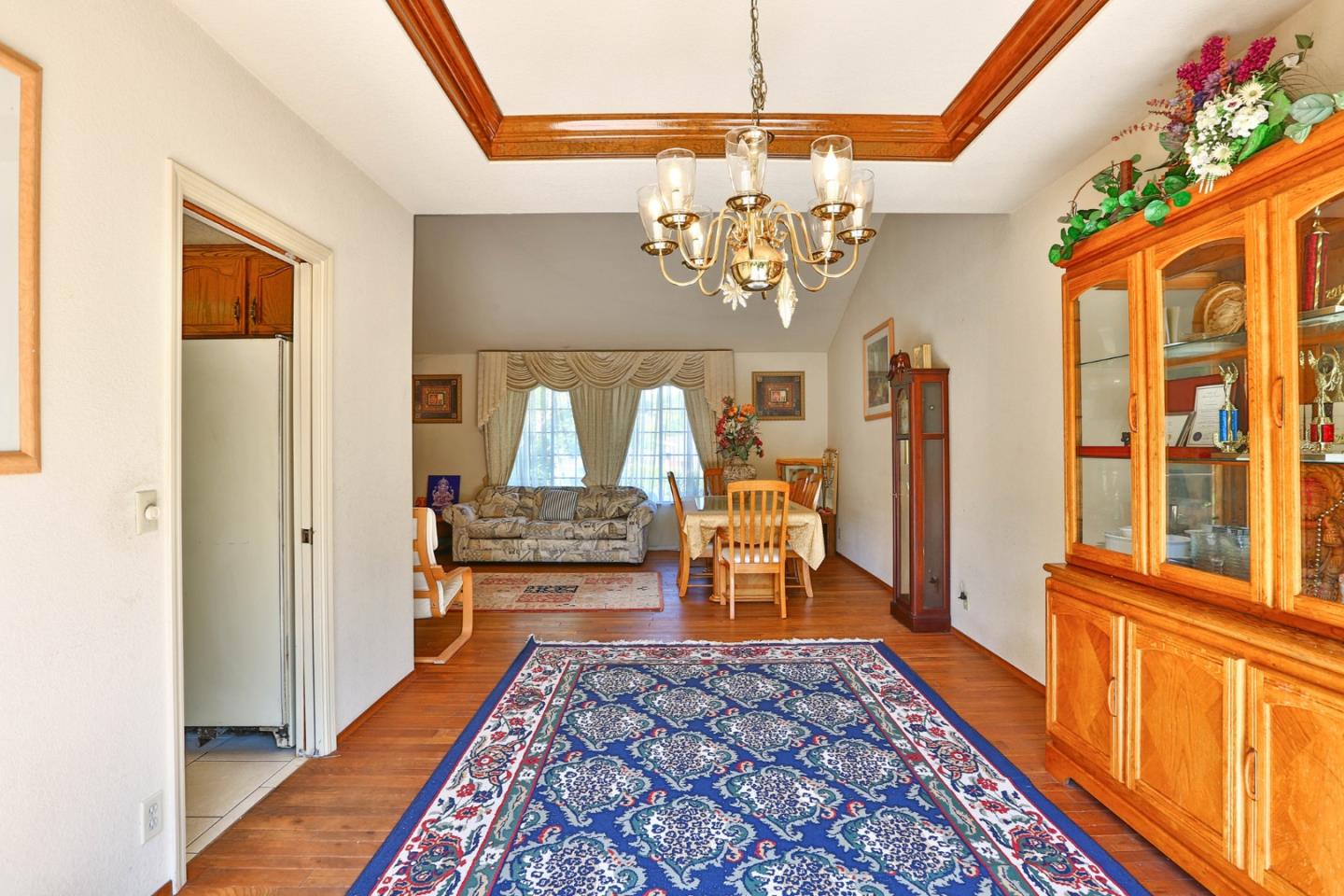 6964 McCall Drive San Jose, CA 95120 - Photo 21 of 57 a very nice looking room with wooden floor and a large window