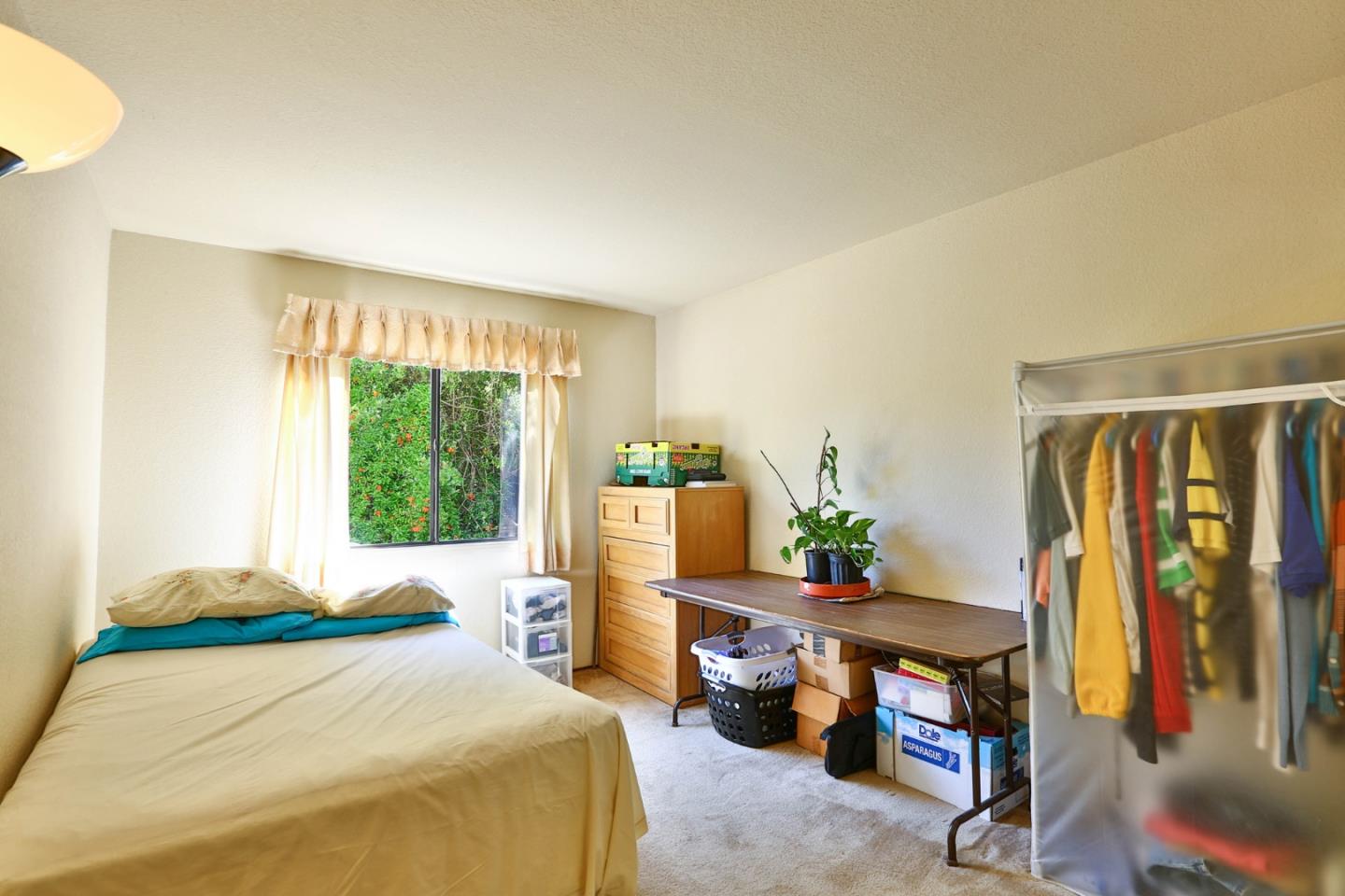 6964 McCall Drive San Jose, CA 95120 - Photo 24 of 57 a bedroom with furniture and a window