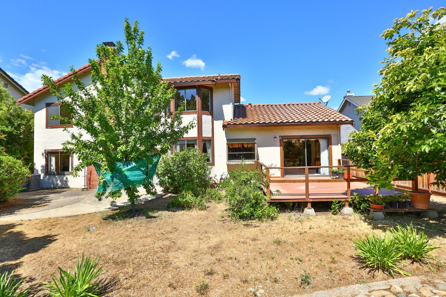 6964 McCall Drive San Jose, CA 95120 - Photo 28 of 57 a front view of a house with a yard