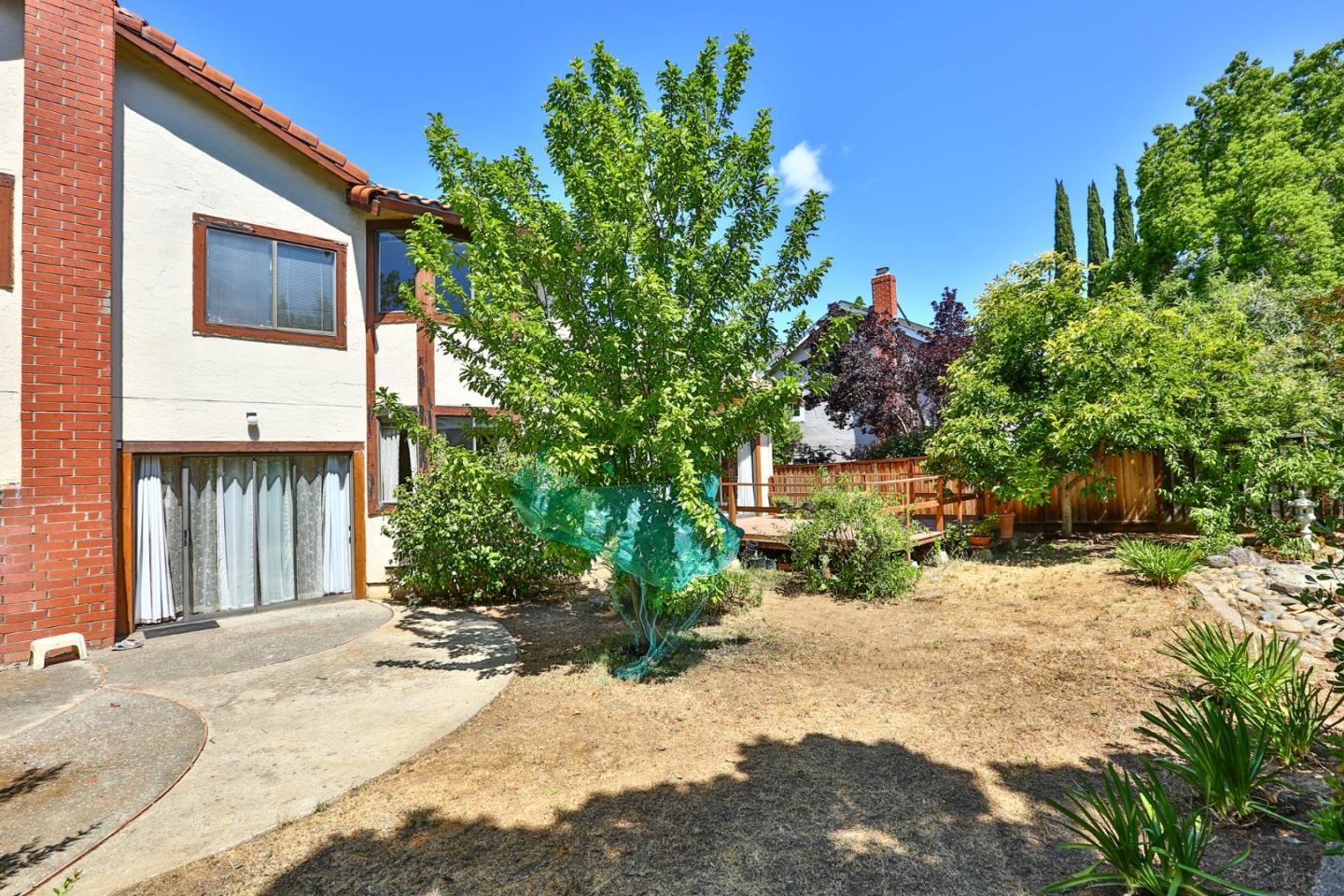 6964 McCall Drive San Jose, CA 95120 - Photo 29 of 57 a view of a house with a yard
