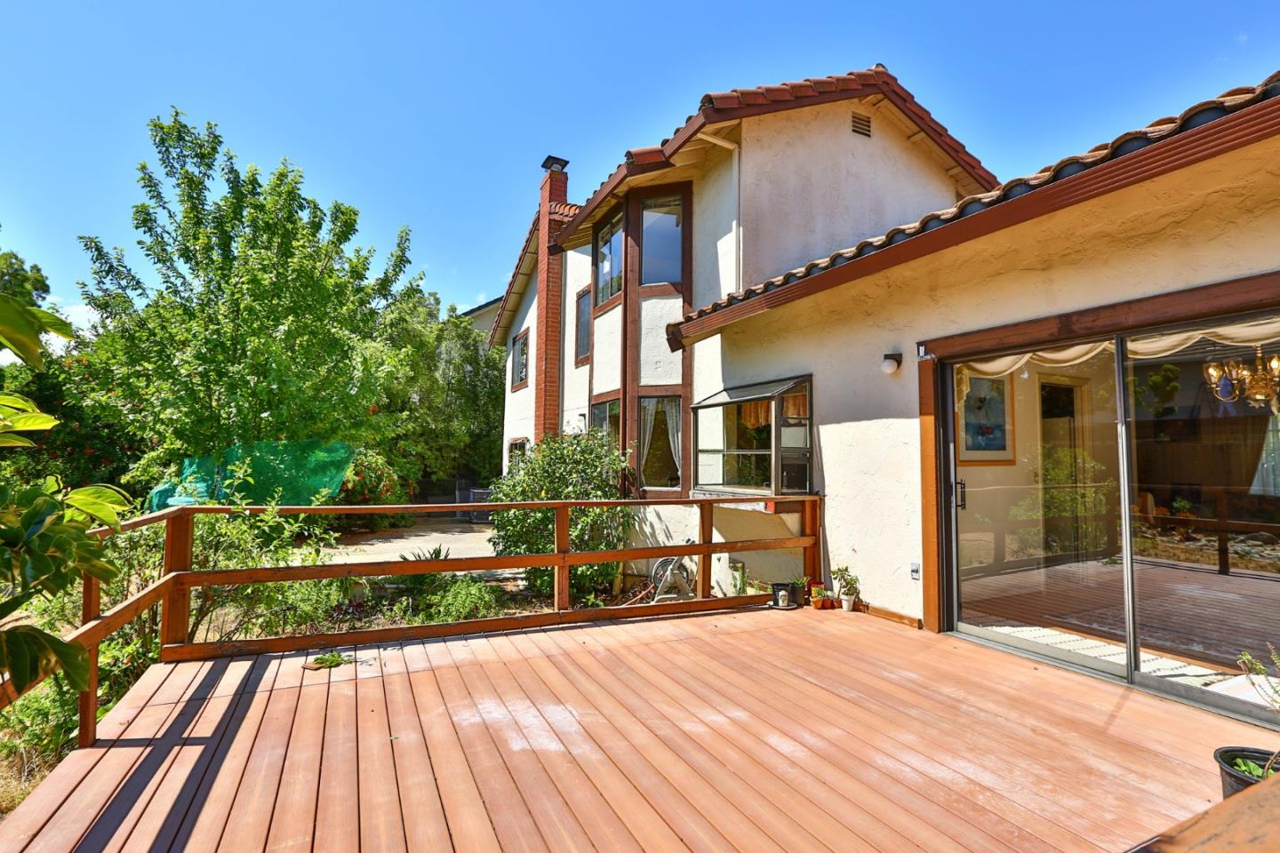 6964 McCall Drive San Jose, CA 95120 - Photo 33 of 57 a view of house with yard outdoor seating and deck