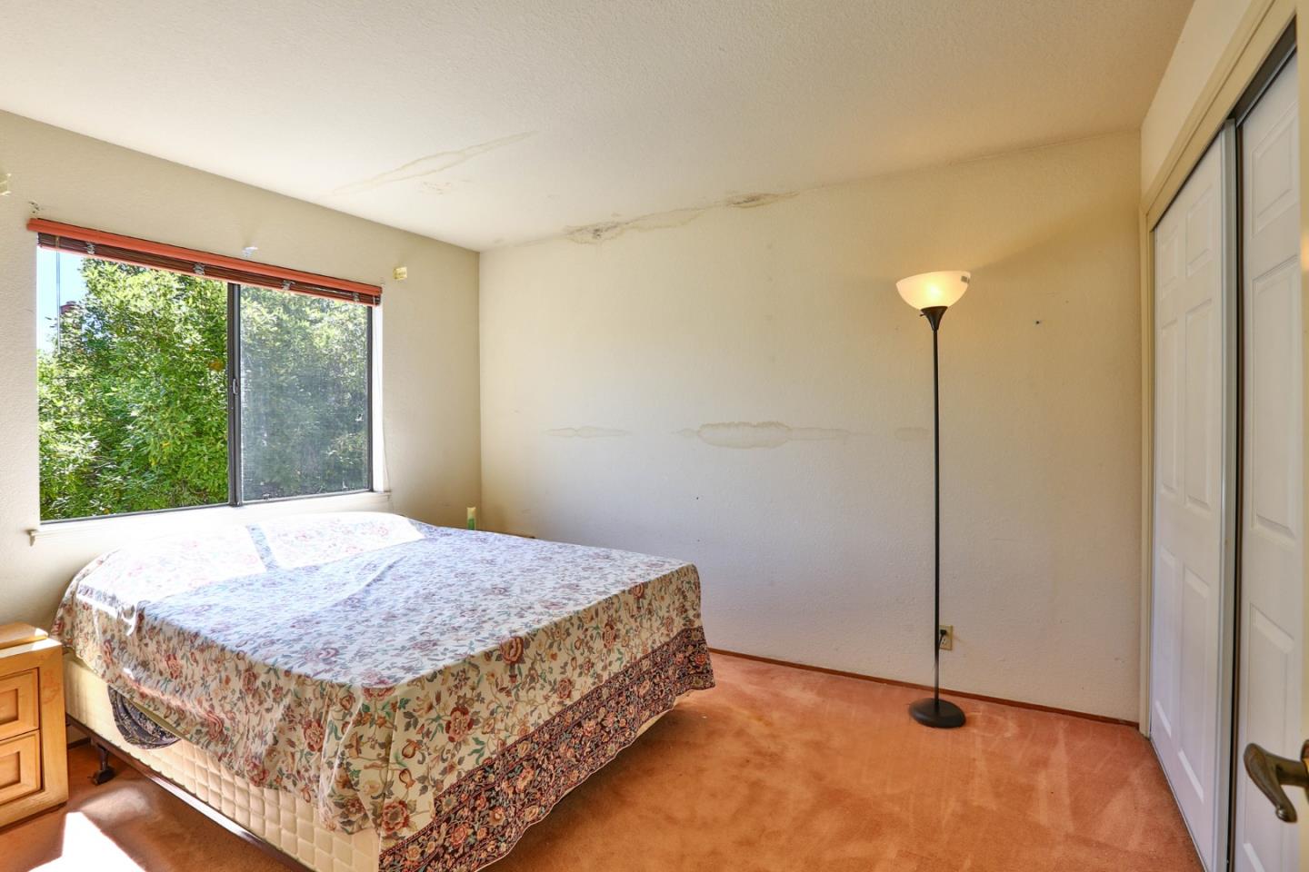 6964 McCall Drive San Jose, CA 95120 - Photo 38 of 57 a bed sitting in a room next to a window