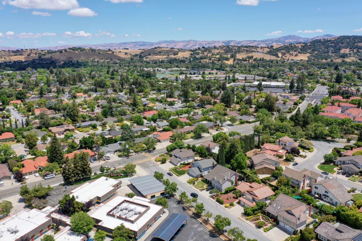 6964 McCall Drive San Jose, CA 95120 - Photo 56 of 57 an aerial view of a city with lots of residential buildings