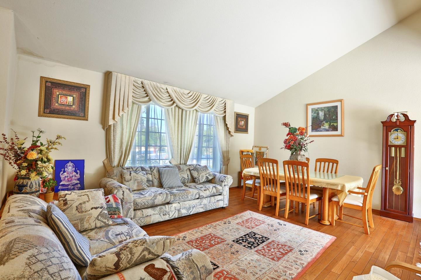 6964 McCall Drive San Jose, CA 95120 - Photo 6 of 57 a living room with furniture and a wooden floor