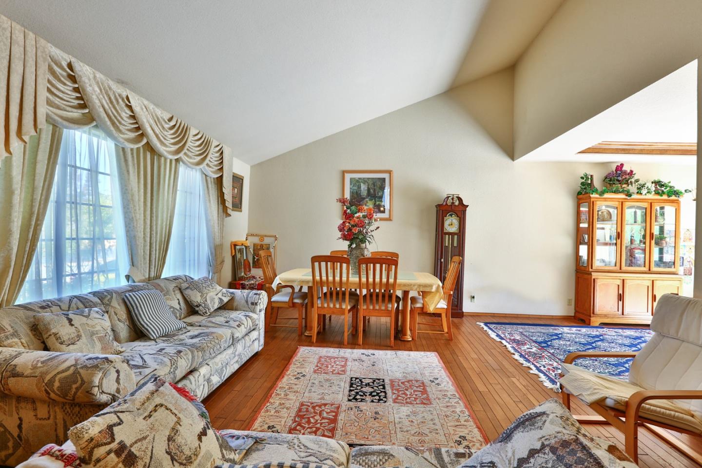 6964 McCall Drive San Jose, CA 95120 - Photo 7 of 57 a living room with furniture and a window