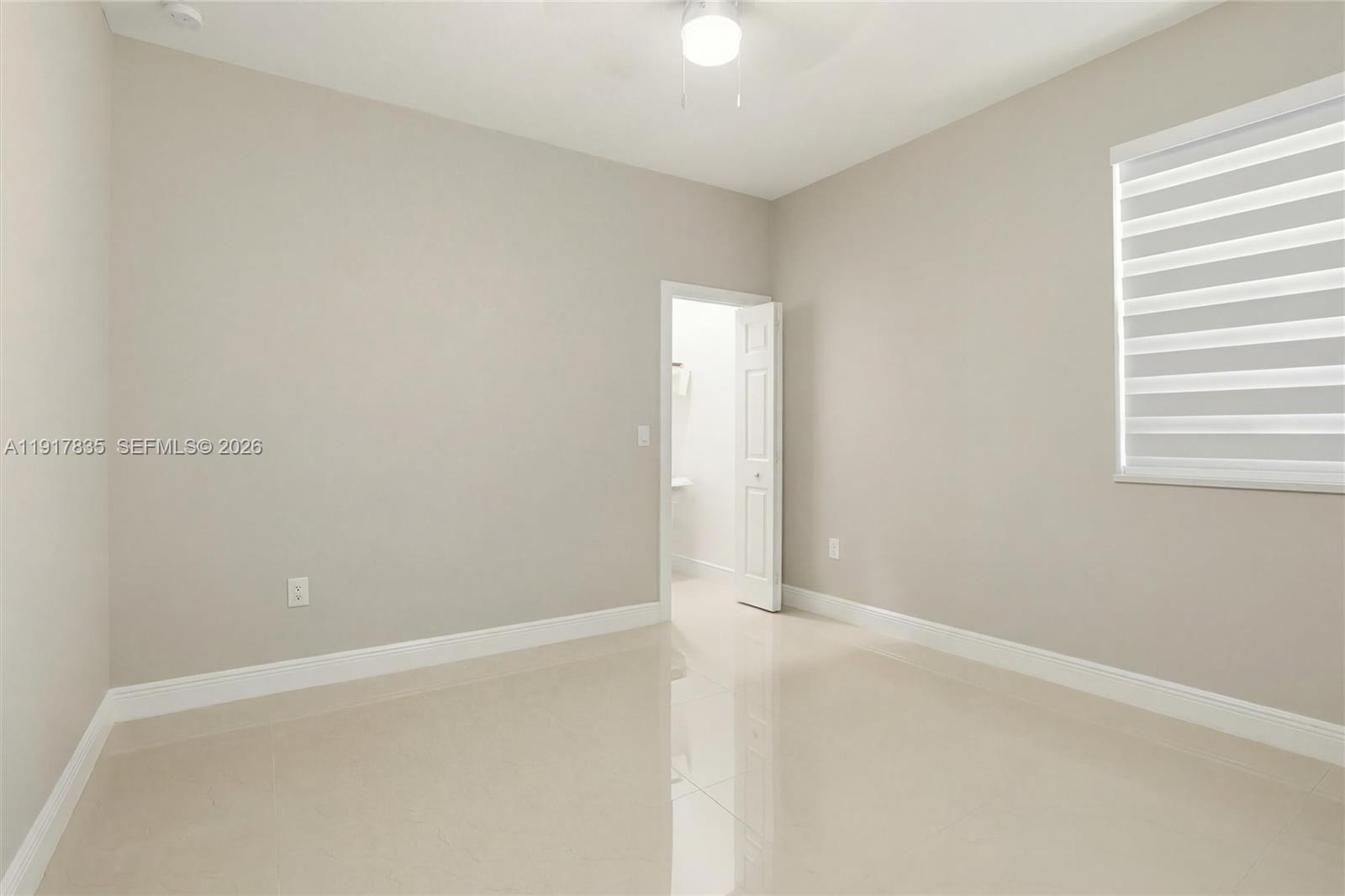 2908 9th Street Southwest Lehigh Acres, FL 33976 - Photo 35 of 44 a view of an empty room