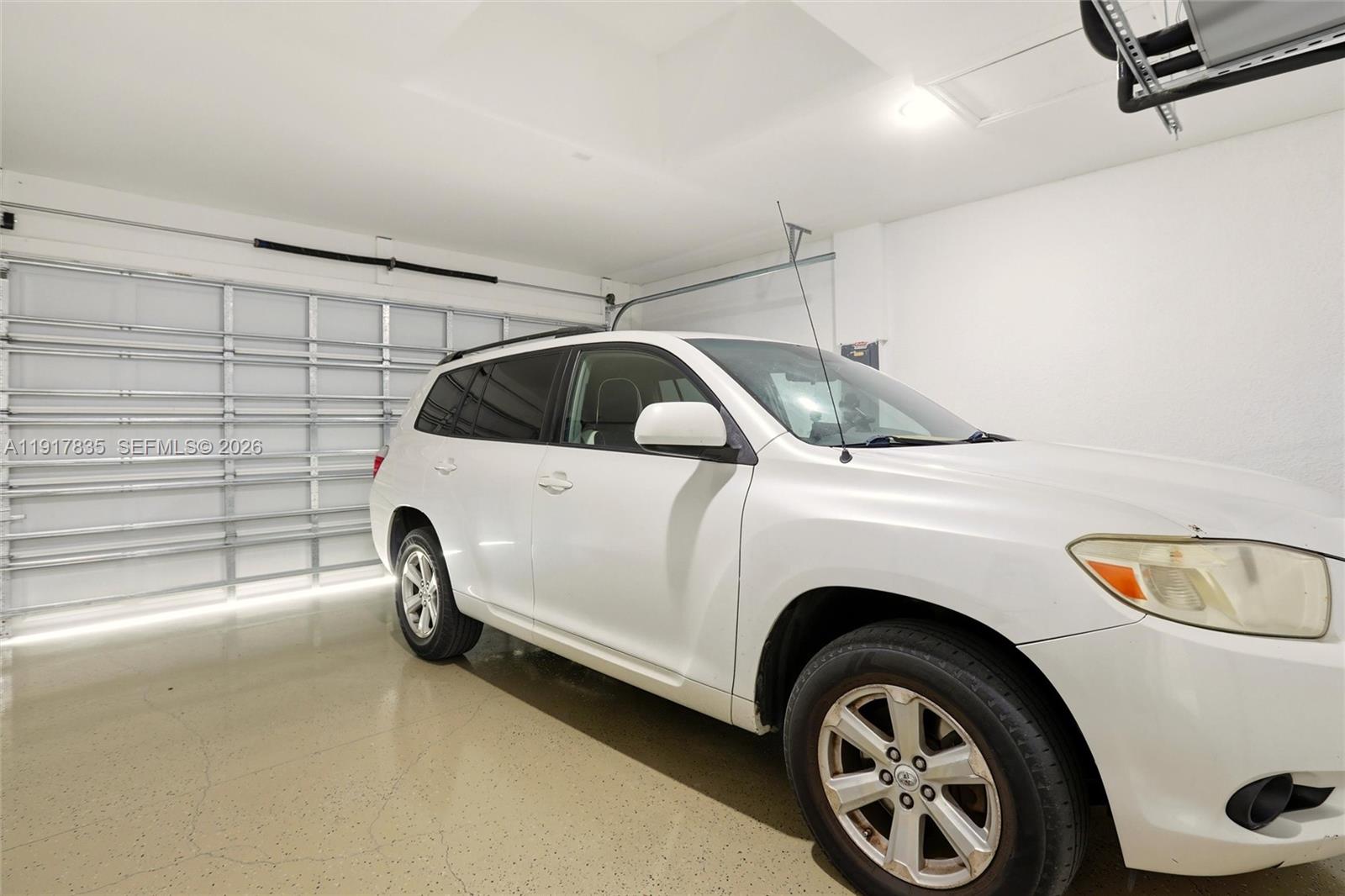 2908 9th Street Southwest Lehigh Acres, FL 33976 - Photo 41 of 44 a utility room with dryer and washer