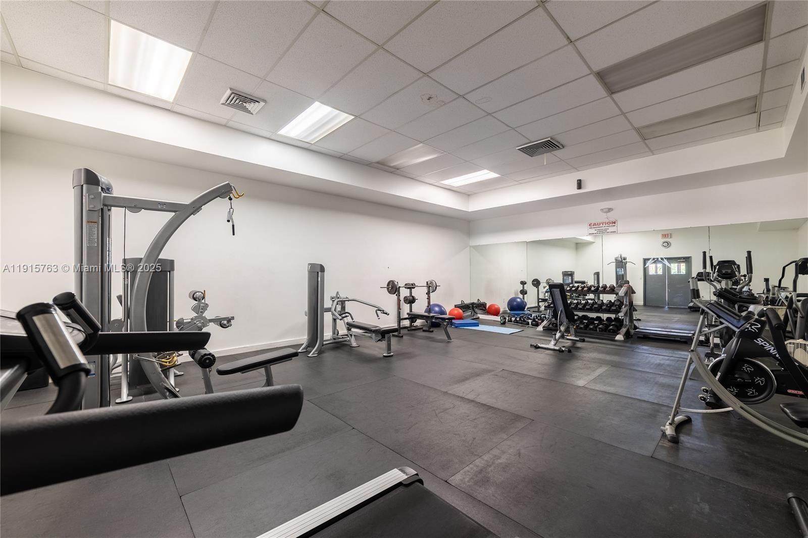 505 East Dania Beach Boulevard, Unit 41K Dania Beach, FL 33004 - Photo 21 of 22 a view of a room with gym equipment