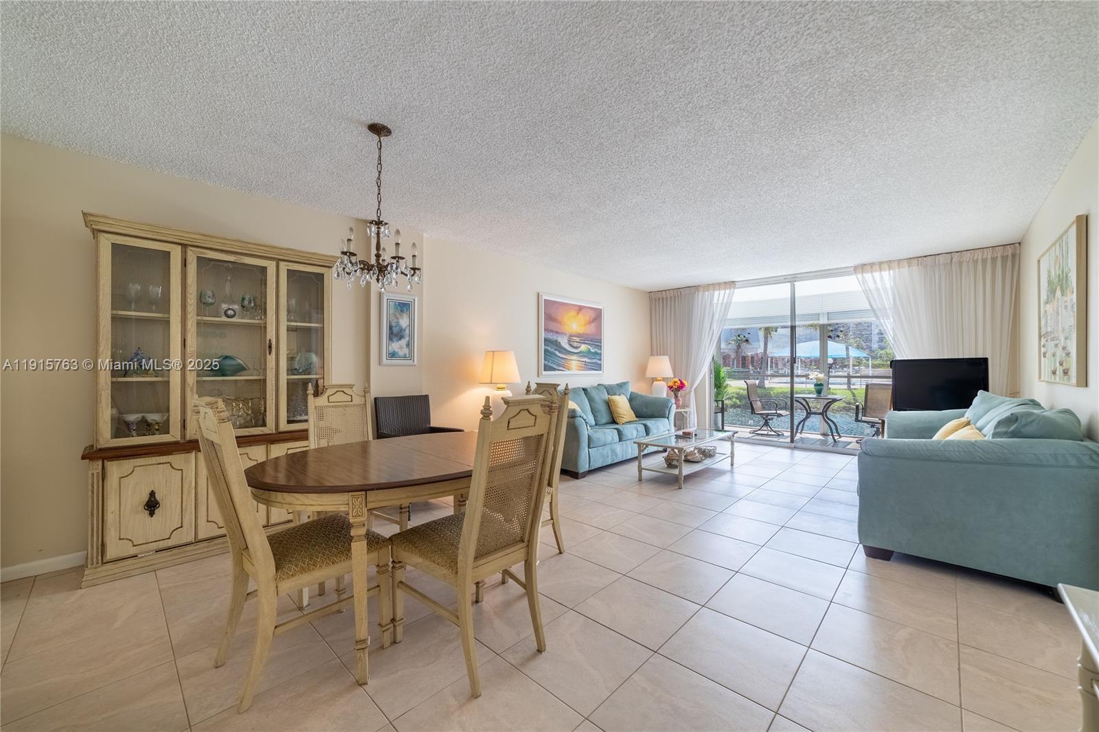 505 East Dania Beach Boulevard, Unit 41K Dania Beach, FL 33004 - Photo 7 of 22 a dining room with furniture and window