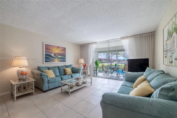 a living room with furniture and a couch