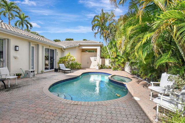 a view of a house with swimming pool