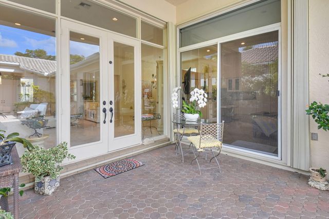 a outdoor space with porch and glass door