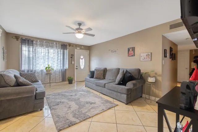a living room with furniture and a couch