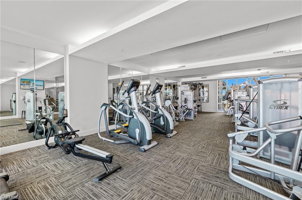 3000 Oasis Grand Boulevard, Unit 2702 Fort Myers, FL 33916 - Photo 32 of 34 a view of a room with gym equipment