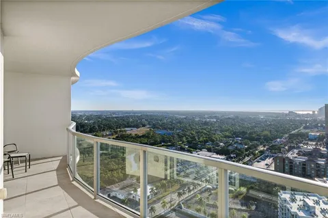 a view of a balcony with city view