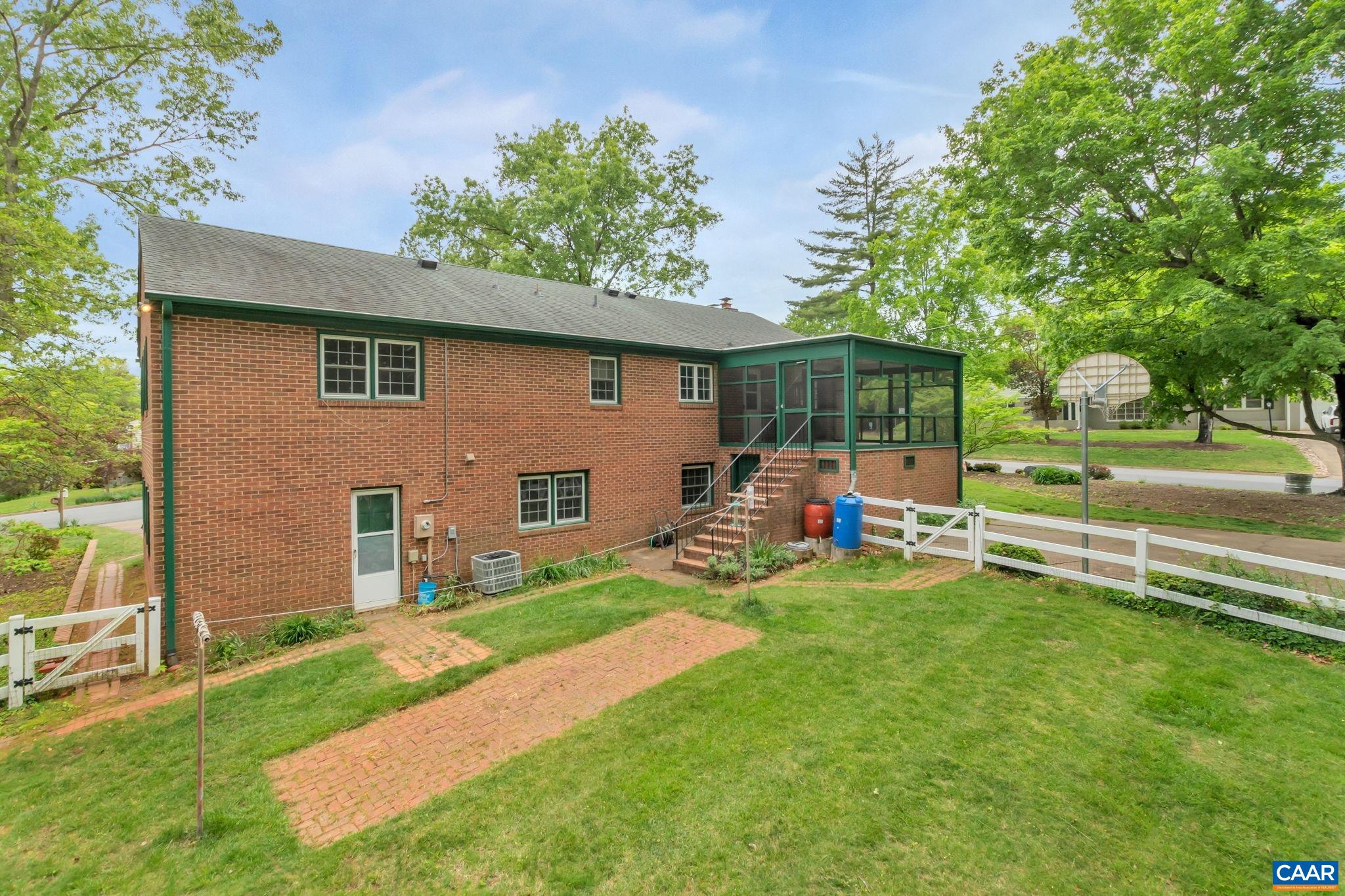 2602 Bennington Road Charlottesville, VA 22901 - Photo 35 of 50 a view of a backyard with a sitting area and slide