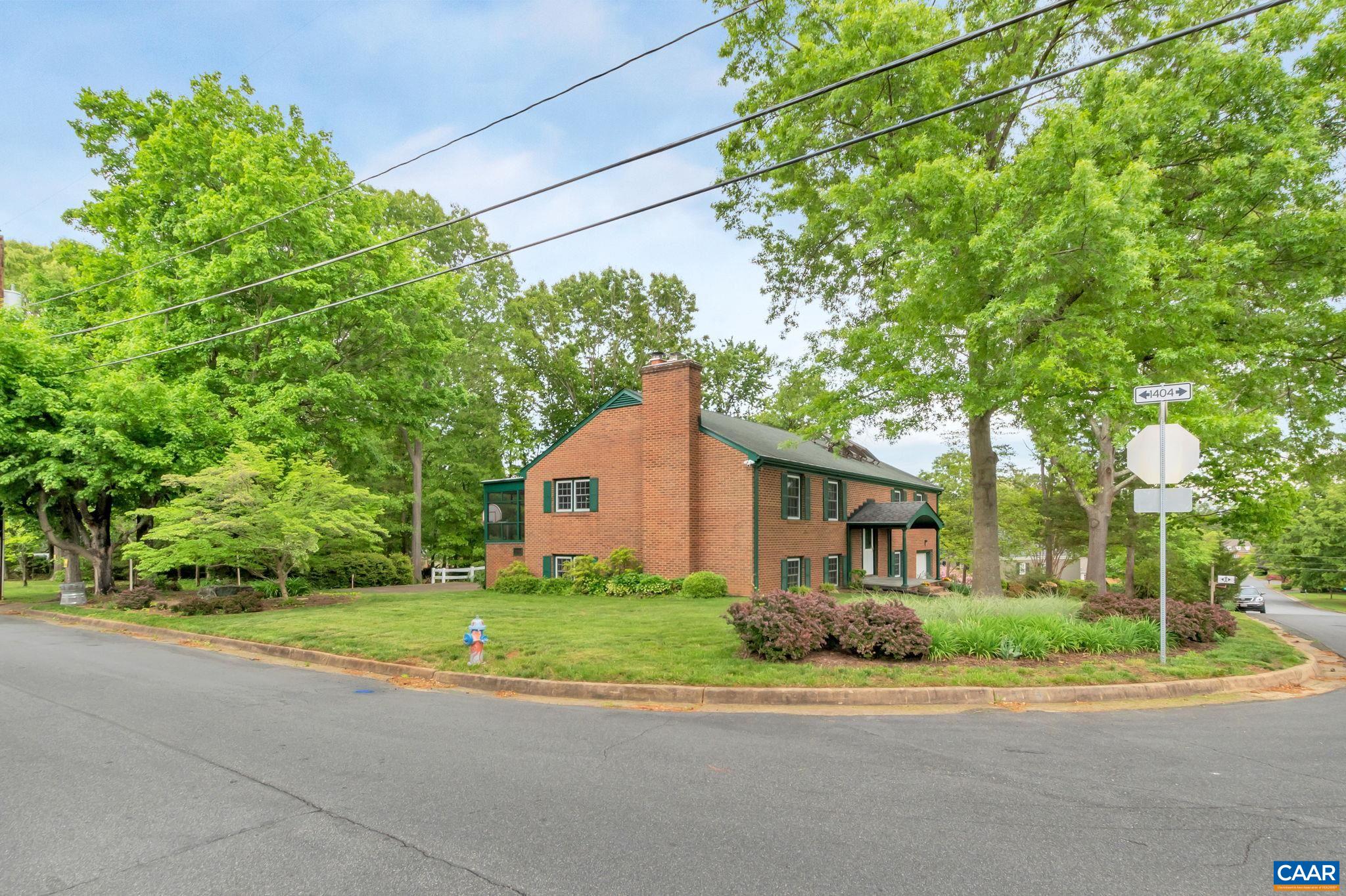 2602 Bennington Road Charlottesville, VA 22901 - Photo 42 of 50 a view of a house with a yard and large trees