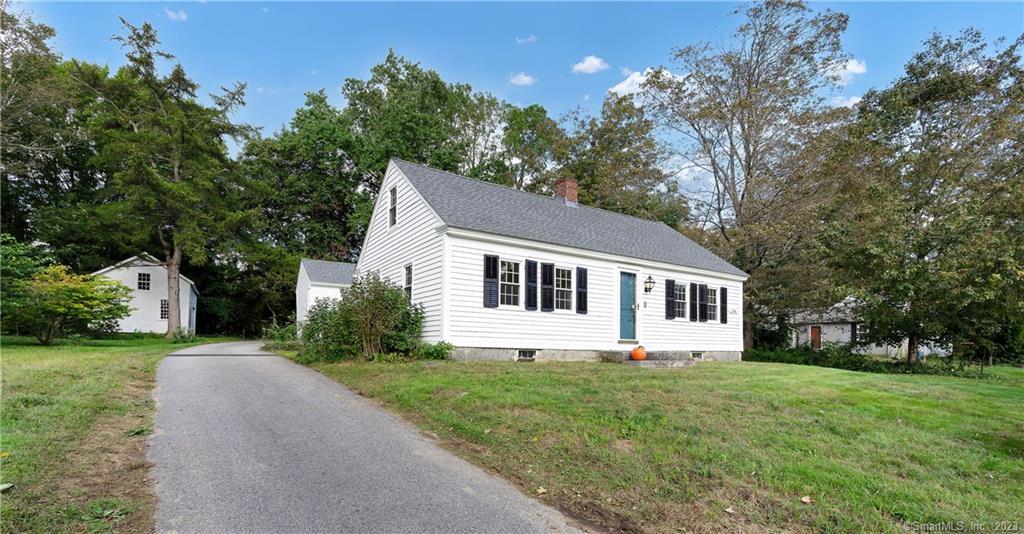 980 Storrs Road Mansfield, CT 06268 - Photo 1 of 1 a house that has a tree in it