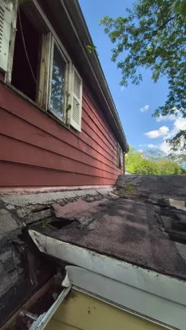 a view of a backyard and a house