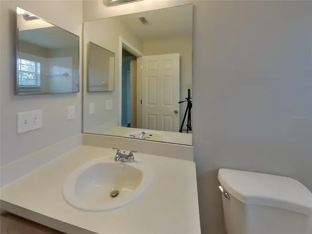 a bathroom with a sink and a toilet