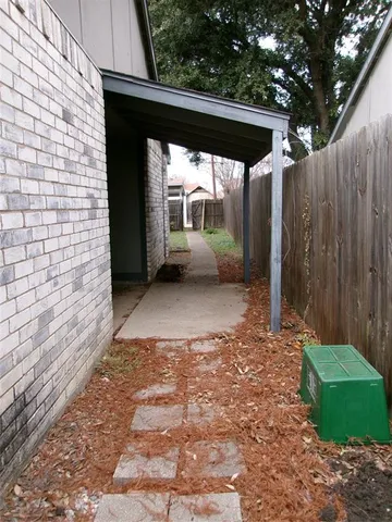 a view of a back yard of the house