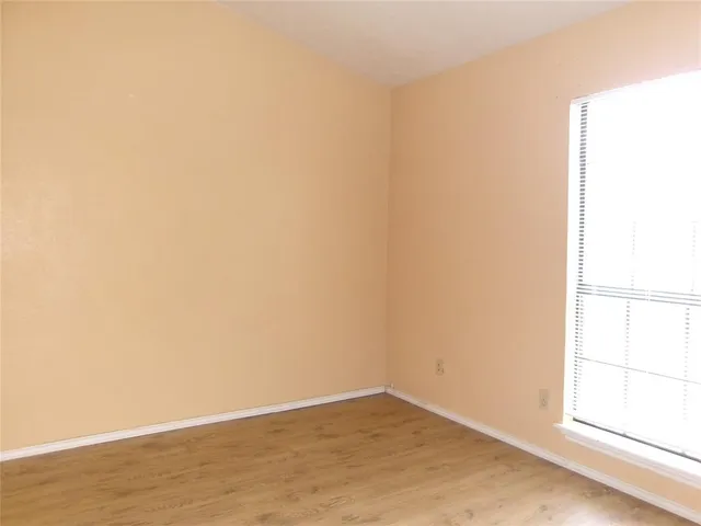 a bathroom with a sink vanity and mirror