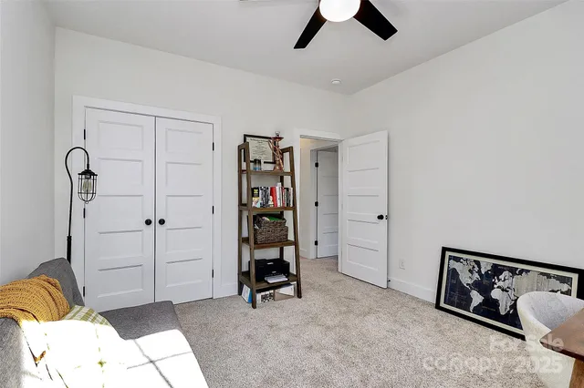 a view of a livingroom with a furniture