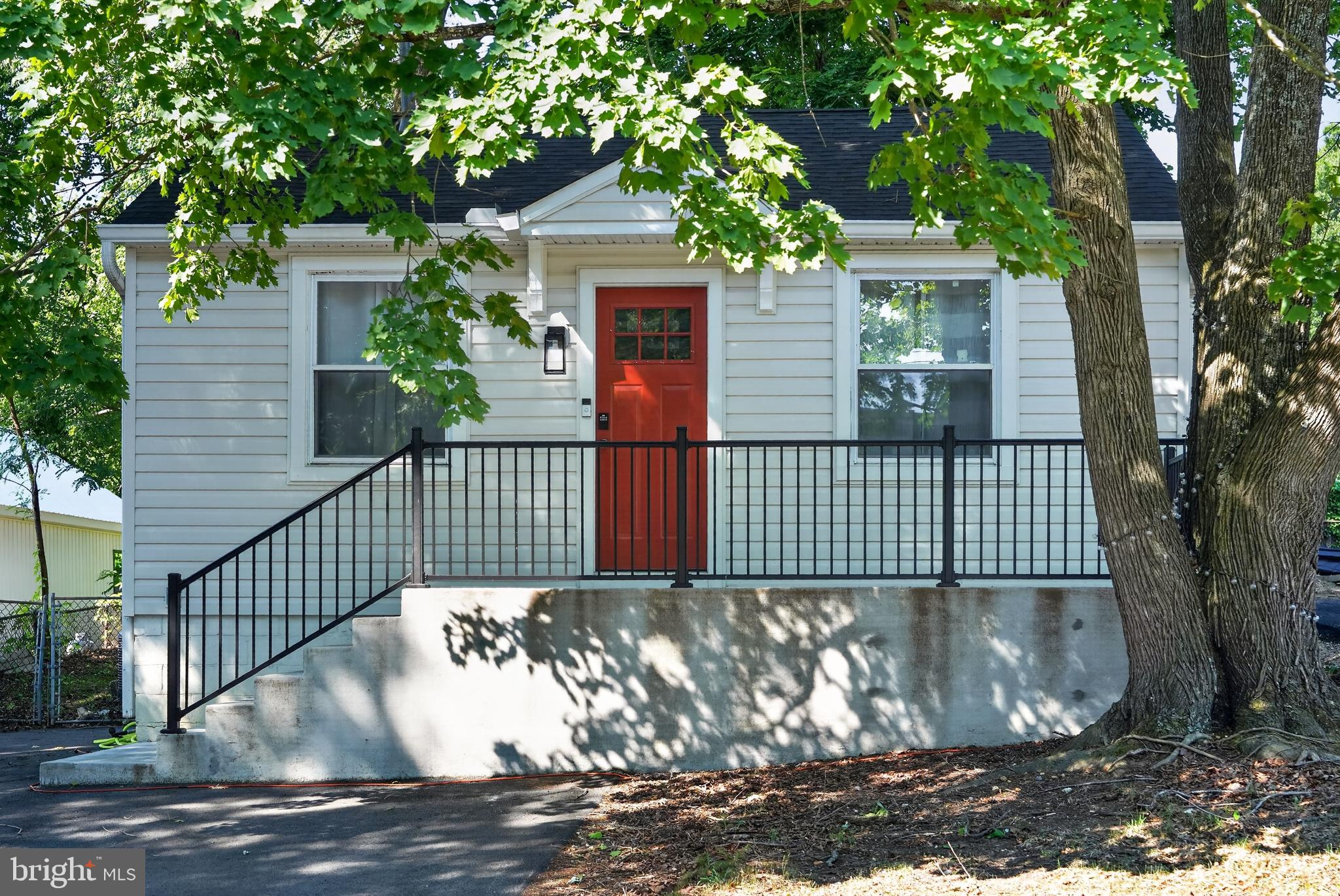 3670 5th Avenue Edgewater, MD 21037 - Photo 2 of 60 a house view with a garden