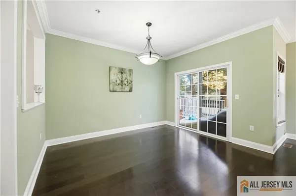 a view of a room with window wooden floor and windows