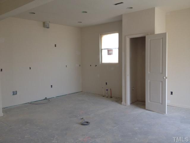 405 Hope Valley Road Knightdale, NC 27545 - Photo 9 of 10 a view of an empty room with a window