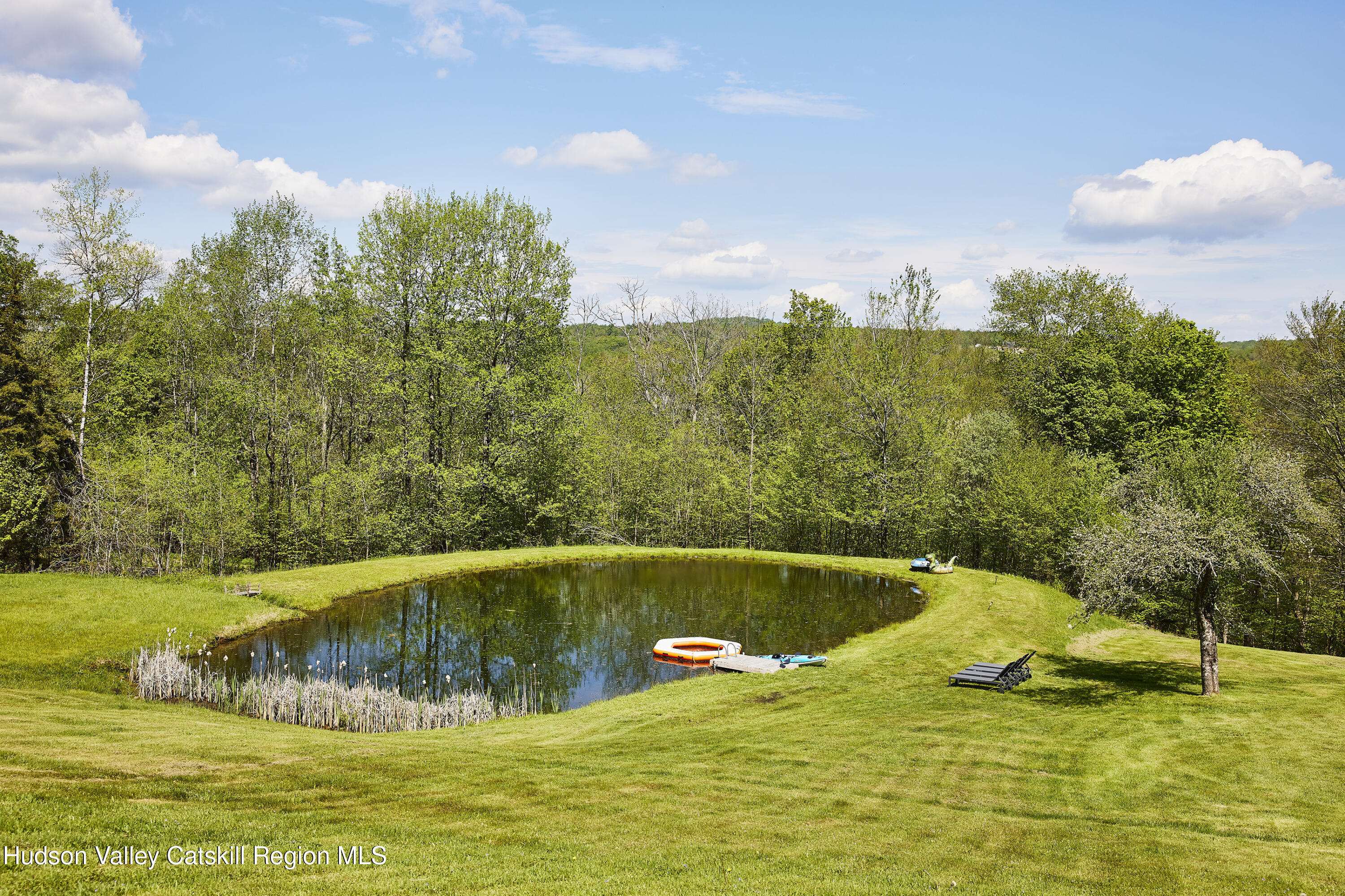 55 Hunter Road Parksville, NY 12768 - Photo 26 of 35 a view of a swimming pool with a yard