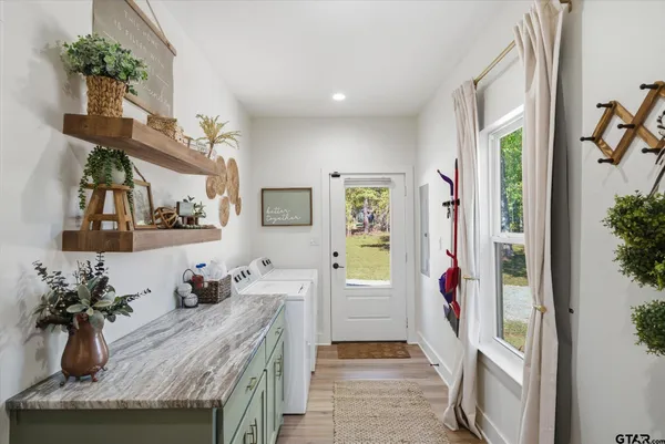 a view of living room and kitchen