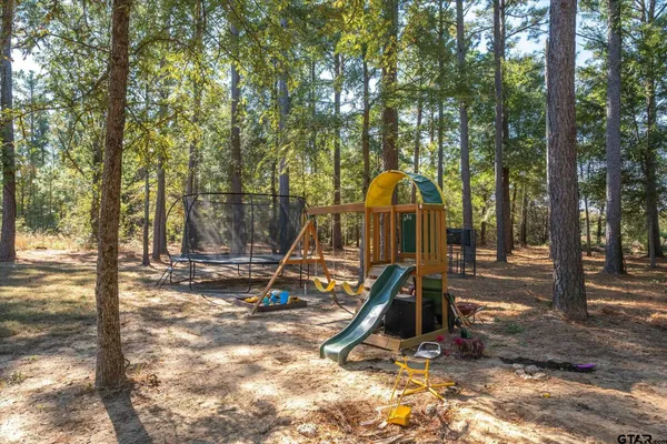a view of a park with slide