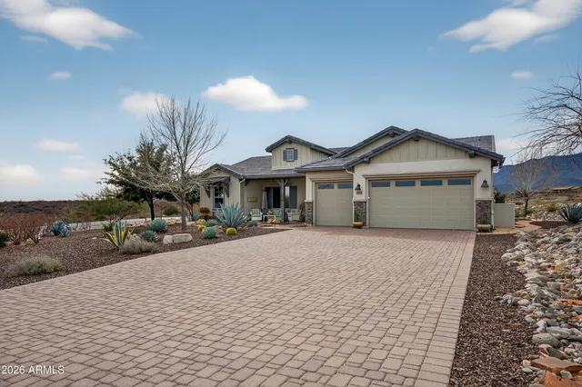 a bathroom with a sink a vanity and a mirror