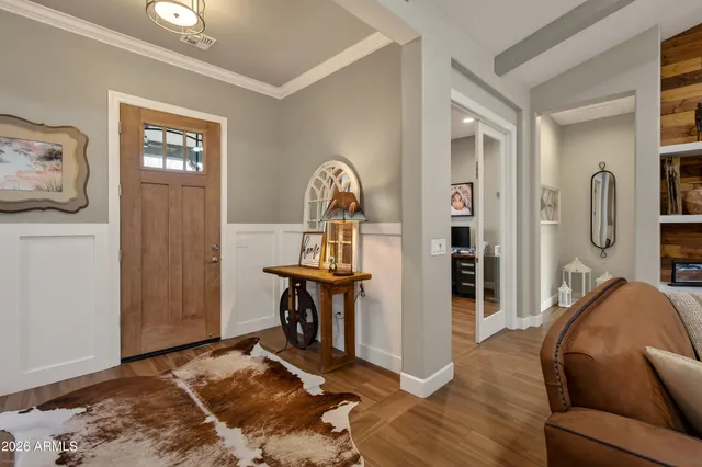 a kitchen with granite countertop a sink stainless steel appliances and cabinets