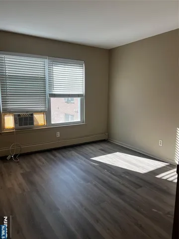 a bathroom with a sink toilet and mirror