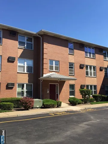 a kitchen with stainless steel appliances a refrigerator stove and sink