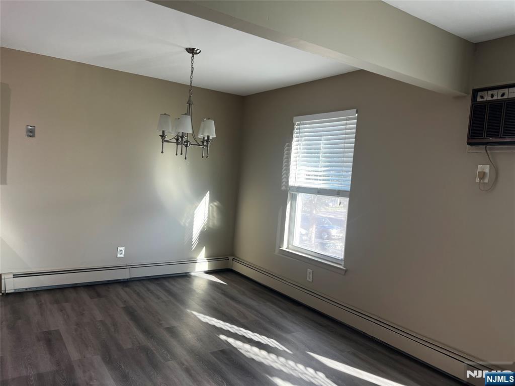 34 Riverview Court, Unit 34 Secaucus, NJ 07094 - Photo 5 of 16 a view of a room with window and wooden floor