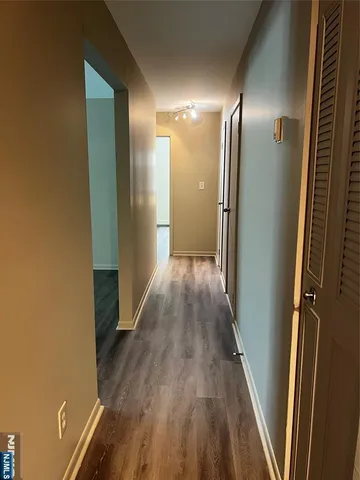 a bathroom with a toilet and a bathtub